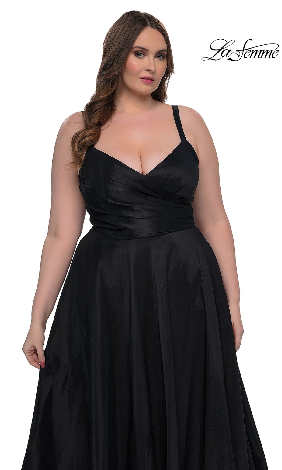 A woman wears the La Femme 33075 long plus-size prom dress, a sleeveless, floor-length black gown with a fitted bodice and elegant A-line skirt. The